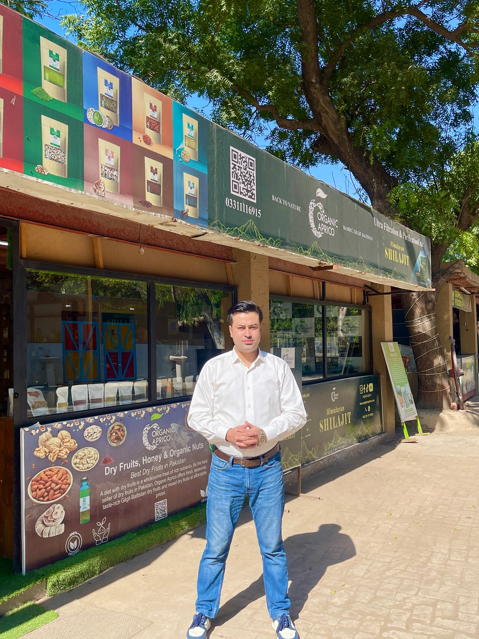 owner organic aprico in front shilajit purification plant